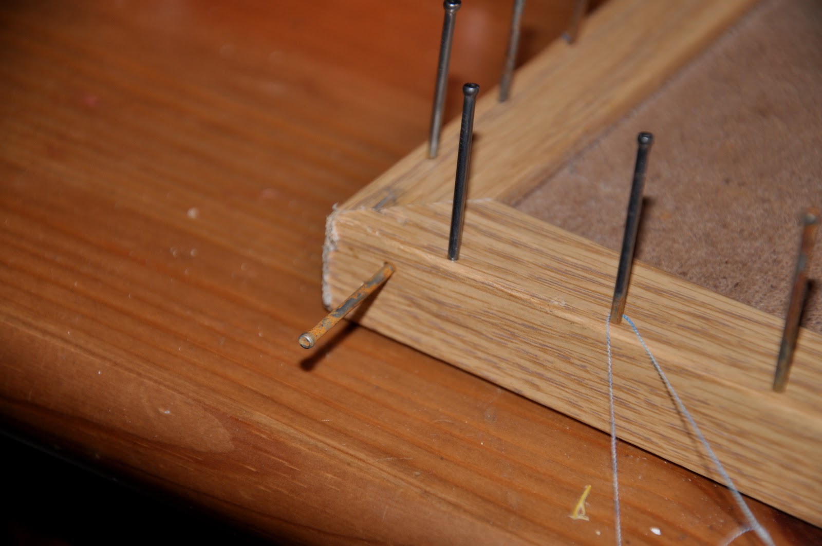 Place one extra nail at the start peg and finish peg of your loom to ...