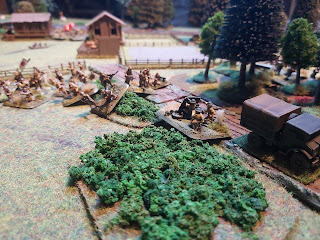 The British 2 pounders are attacked by the Japanese infantry