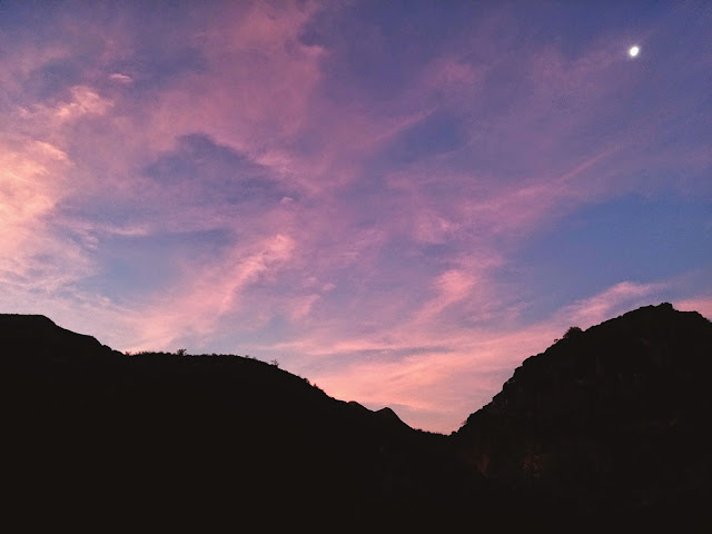 Sunset with moon and red clouds in Naukluft Mountain Zebra Park