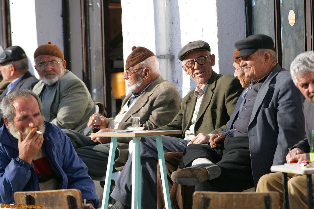 Seeing men sitting around drinking chai and playing board games is very 