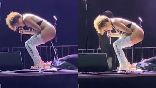 Female Singer Captured Urin@ting into a fan mouth on the stage [Watch video]