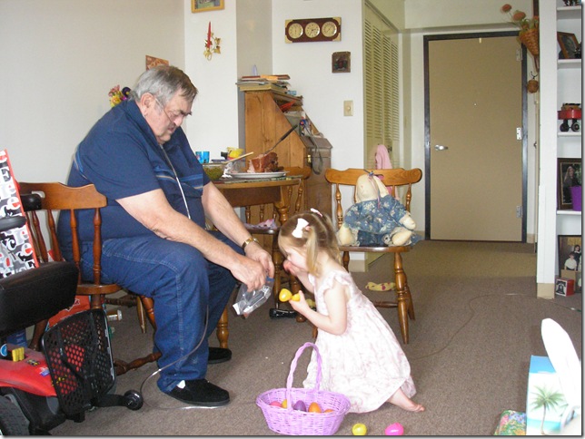 Grampy and Kaitlyn (3 years old) hunting for Easter Eggs at Grammy and Grampy's