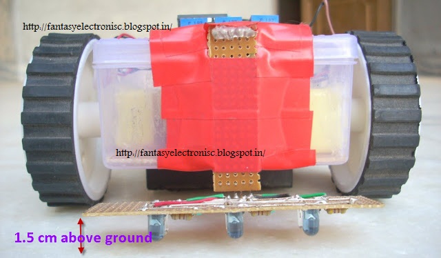 line following robot or line Line Tracker using ATtiny2313  with complete project report, code and circuit diagram.