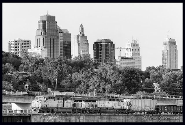 UP 7347 and UP 7374 head east onto the Highline Bridge in Kansas City.