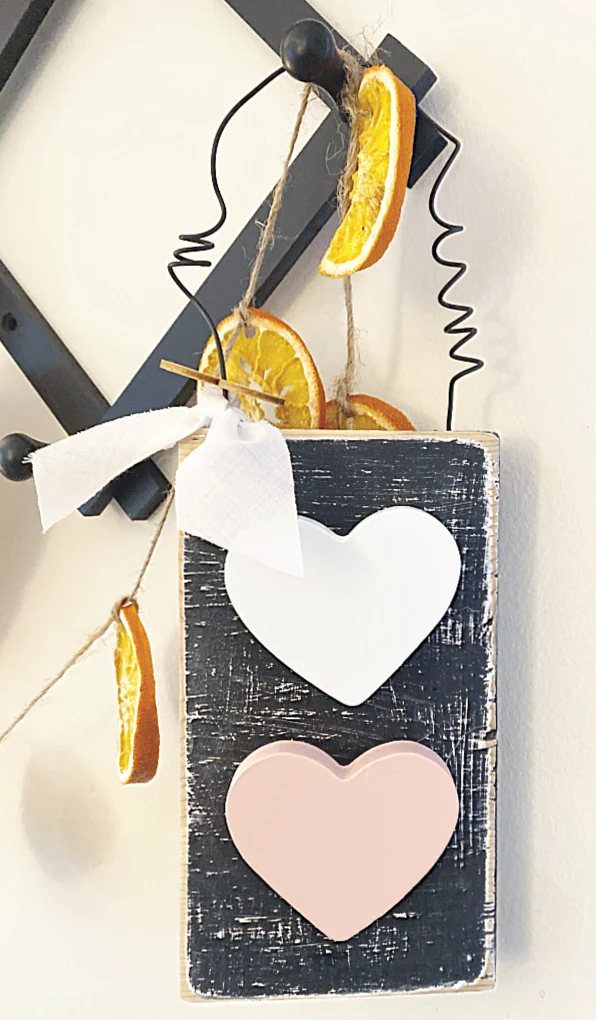 rustic heart decoration hanging on pegs