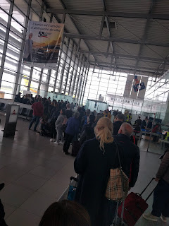 Queue at departure gate at Falconara Airport
