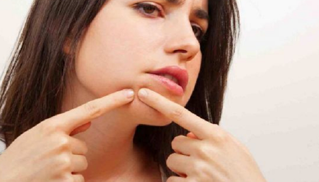 Meaning of pimple location appears in the area of the right or left chin near the end of the lips