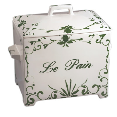 ceramic bread box, white with green letters and decoration; says Le Pain