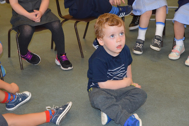 Boy listening to entertainer 