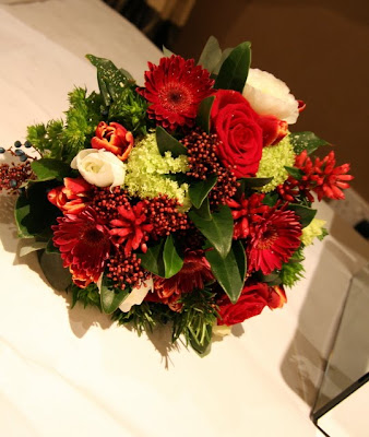 The Handle of the wedding bouquet was bound with Red White Polka Ribbon