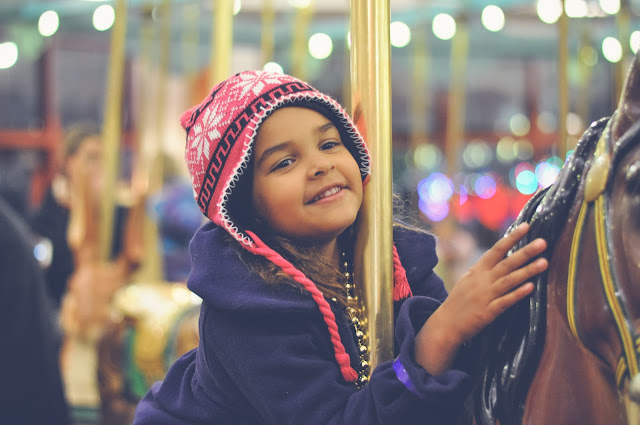 Little Girl on a carousel 