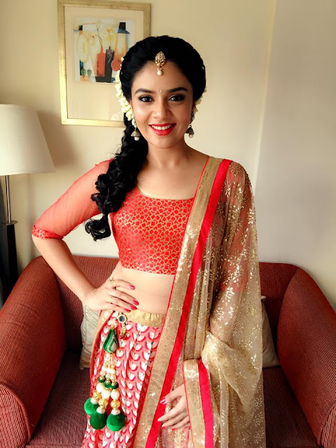 Sreemukhi latest hot image gallery in half saree