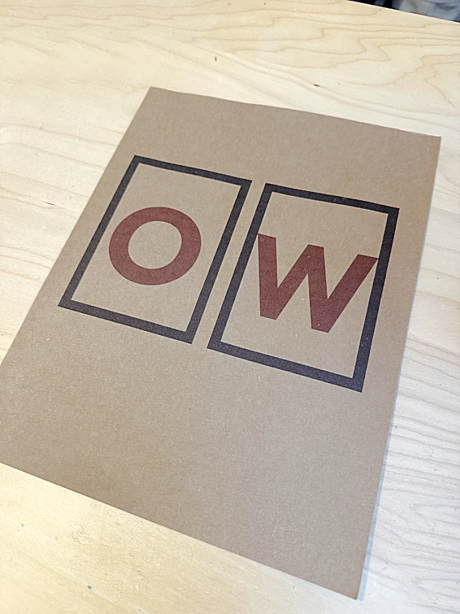 letters on brown card stock