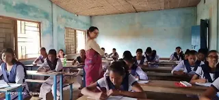 lady teacher , girls students