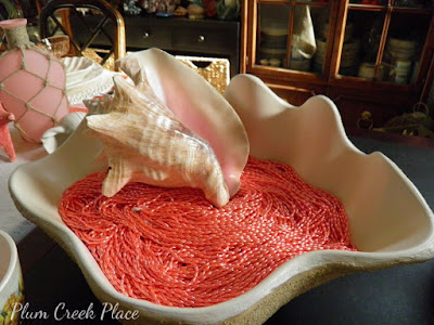 Plum Creek Place - DIY giant clam shell Coral Sunrise Tablescape.