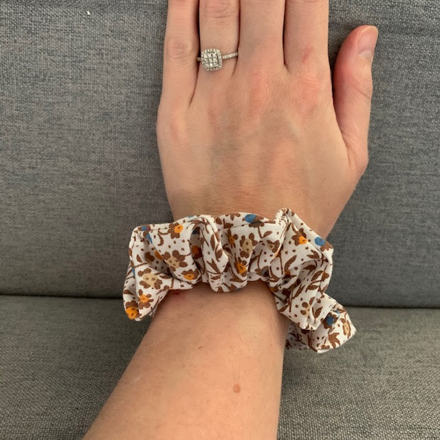 Brown and orange fabric hair scrunchie