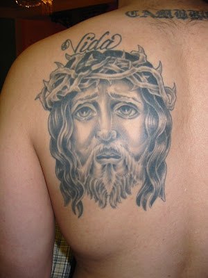 jesus face tattoo This is another nice tattoo. The thorns, beard and the