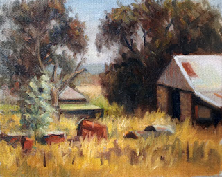 Oil painting of a bluestone barn with corrugated iron roof beside several eucalytpts and surrounded by dry grass.