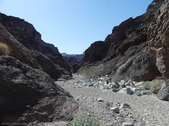 26: wide canyon with sloping sides