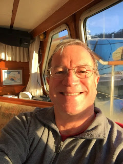 Bill basking in sunlight  in pilothouse