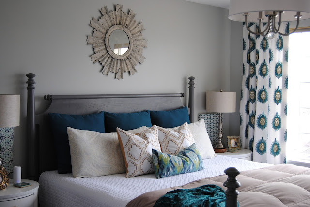 master bedroom, bedroom, bedding, how to make a bed, teal, teal bedding, white bedding, sunburst mirror, mirror over bed