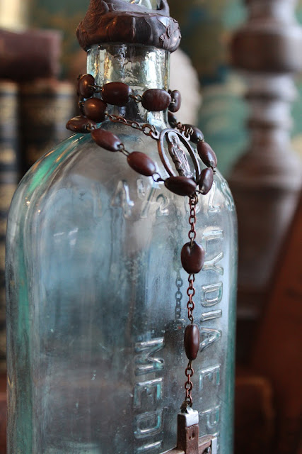 cross bottle, cross bottle guy, Cross Bottle Guy, vintage cross bottles, antique cross bottles, crosses, interior design accessories, must have accessories, luxury home decor, rosary, christian decor, rosary decor, catholic decor, Jesus, Mary, Joseph, Saints, bottles, antique bottles, vintage bottles, hand dug bottles, bottle art, altered bottles, crystals, chandelier crystals, crystal art, solder, solder art, stained glass, teardrop crystals, square crystals, octagonal crystals, crystal cross bottles, crosses on bottles, bottles with crosses on top, crosses on top of bottles, cross stoppers, crystal cross bottle stoppers, aqua bottles, blue bottles, amber bottles, clear bottles, hazy bottles, white bottles, medicine bottles, pharmacy bottles, antique glass bottles, antique glass flask, decor, decorations, designer accessories for the home, interior design accessories, cross bottles, crossbottles, crossbottleguy, vintage cross bottle art, cross bottle art, bottle art, handmade art, unique art, one of a kind art, handmade, unique, art, one of a kind, authentic art, vignette styling