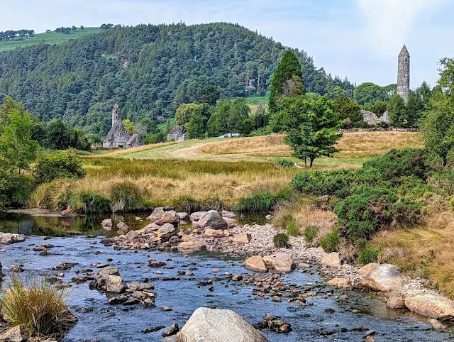 Round tower at Glendalough among the County Wicklow landscape