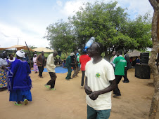 A VHT demonstrating a mobile tippy tap during a dram in Apobo village