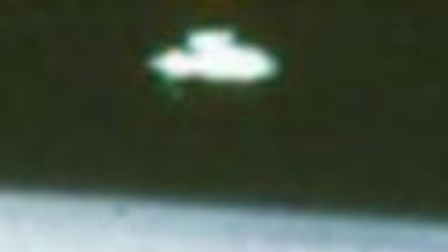 A close up pinch zoom that shows the UFO in the controversial NASA photo.