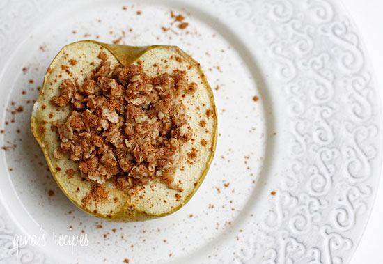 Baked apples topped with oats, cinnamon and brown sugar. Like little individual apple crisps without all the added fuss of cutting and peeling the apples. A simple, low fat, healthy dessert for a cool autumn evening, serve this a la mode for an extra special treat!