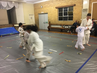 Picture of a Kids Judo game for developing strategy by learning to avoid obstacles at the same time as trying to throw whilst avoiding being thrown by their partner