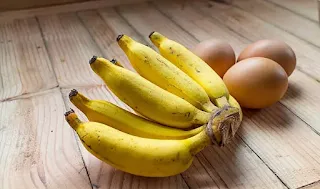 a bunch of bananas and eggs