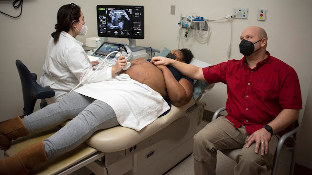 Air Force Col. (Dr.) Veronica Gonzalez-Brown, Chair, Department of Gynecologic Surgery & Obstetrics, performs an ultrasound scan on patient at Brooke Army Medical Center, Fort Sam Houston, Texas, Jan. 27, 2022. Ultrasound scans use high-frequency sound waves to create images of the inside of the body and are often used to  evaluate fetal development. (U.S. Army photo by Jason W. Edwards)