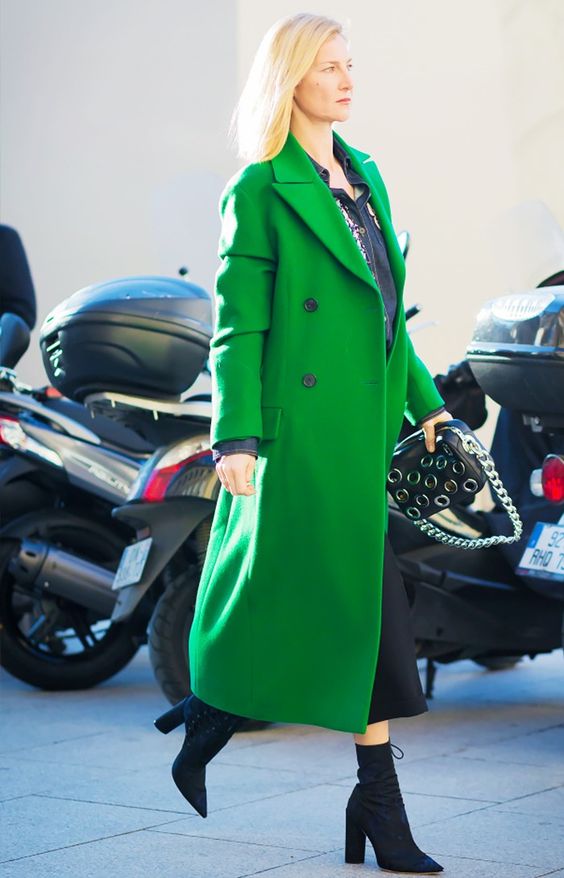 Woman wearing a Wool Green coat