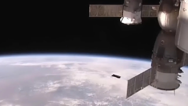 The ISS live feed cameras picked up a UFO sneaking past the ISS.