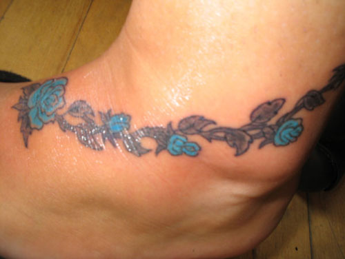 flower tattoos on lower hip