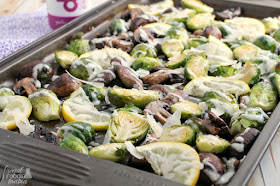 Fresh brussels sprouts & mushrooms are oven roasted until tender & caramelized & then topped with a rich & savory garlic Parmesan sauce in these Garlic Parmesan Roasted Brussels Sprouts & Mushrooms.