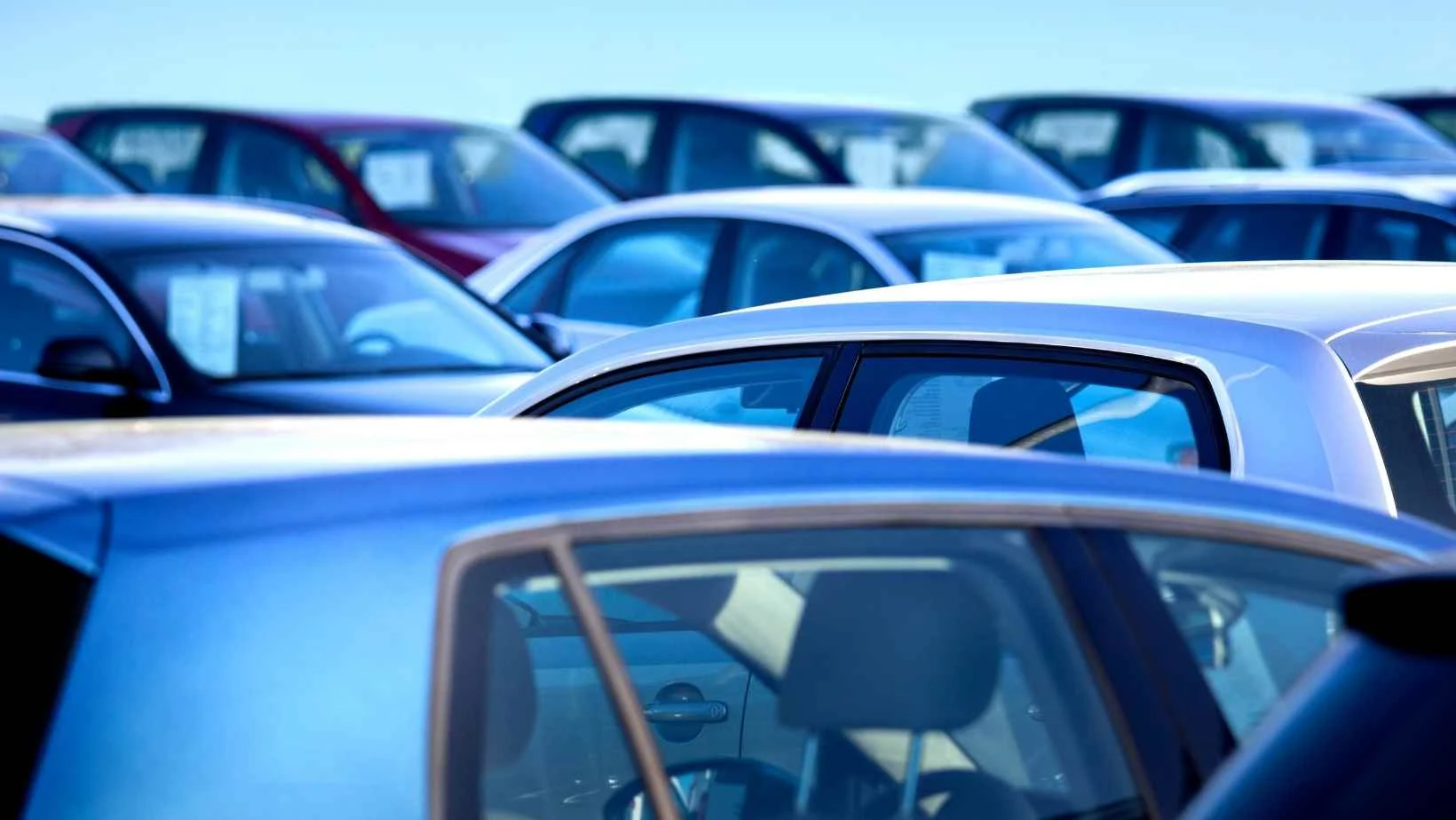 Canva pro stock image of lots of cars illustrating choosing a safe family car