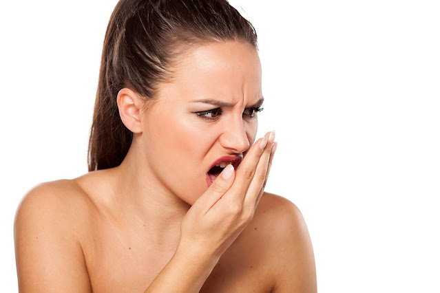 Woman have Bad Breath From Mouth