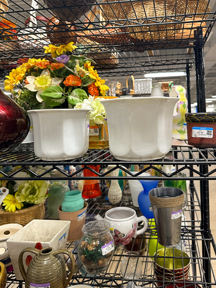 white planters from thrift store