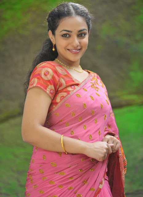 Nithya Menon Spicy Indian Film Actress and Playback Singer very beautiful and hot sexy stills Wallpapers Free Download