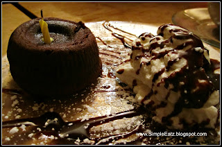 Chocolate Souffle (left). whipped cream with fudge drizzled on top (right)