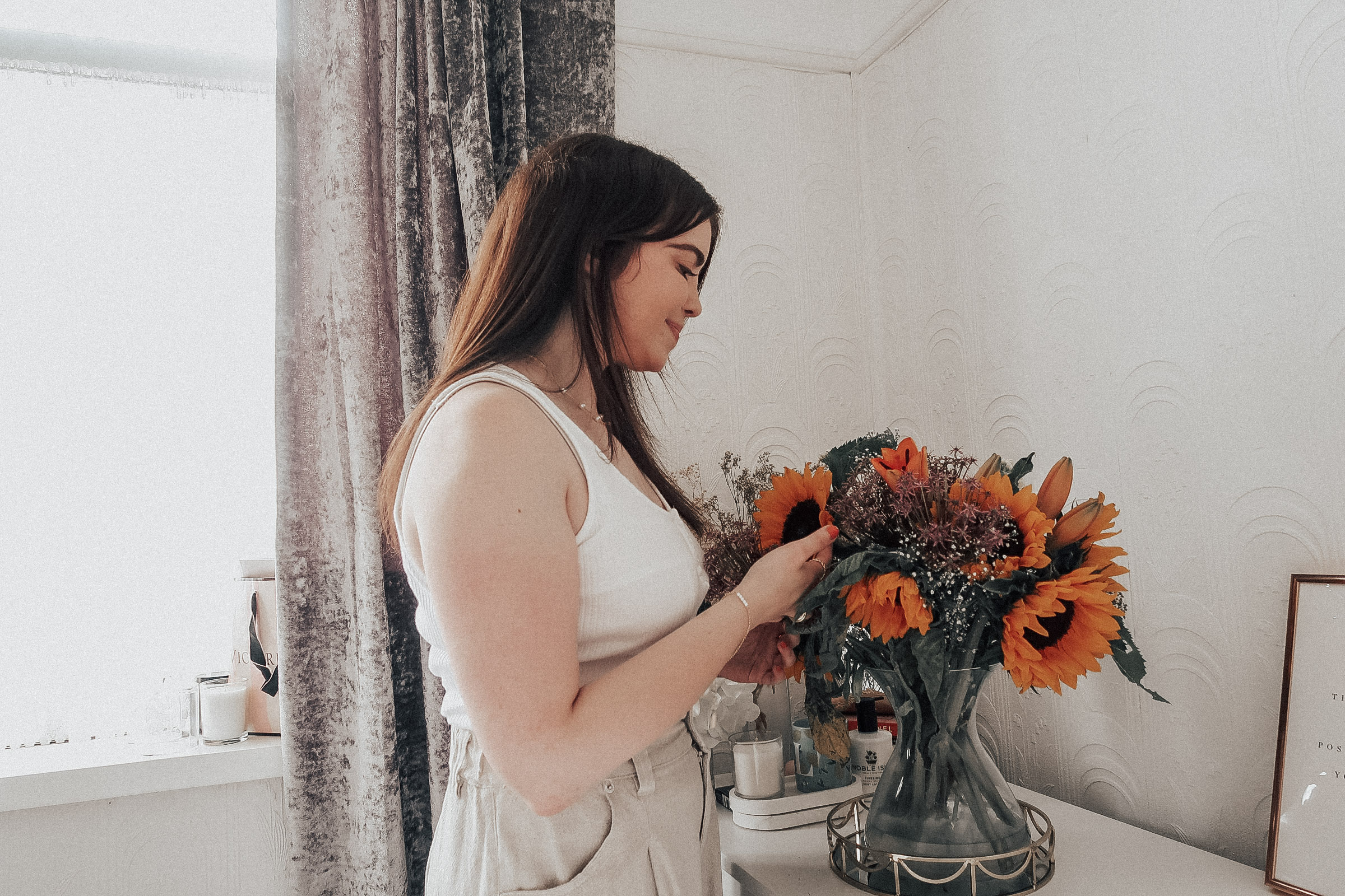 A woman with a bunch of flowers