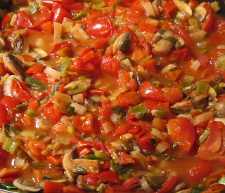 Cooking Tomato Sauce with Veggies