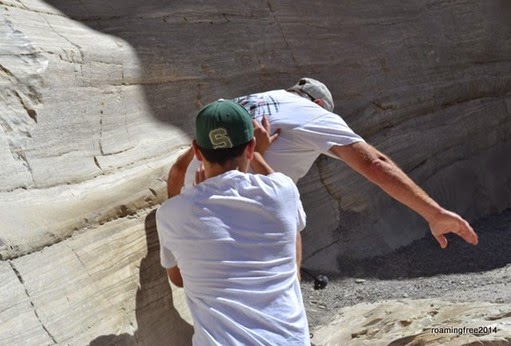 Helping Tom up the slippery marble!