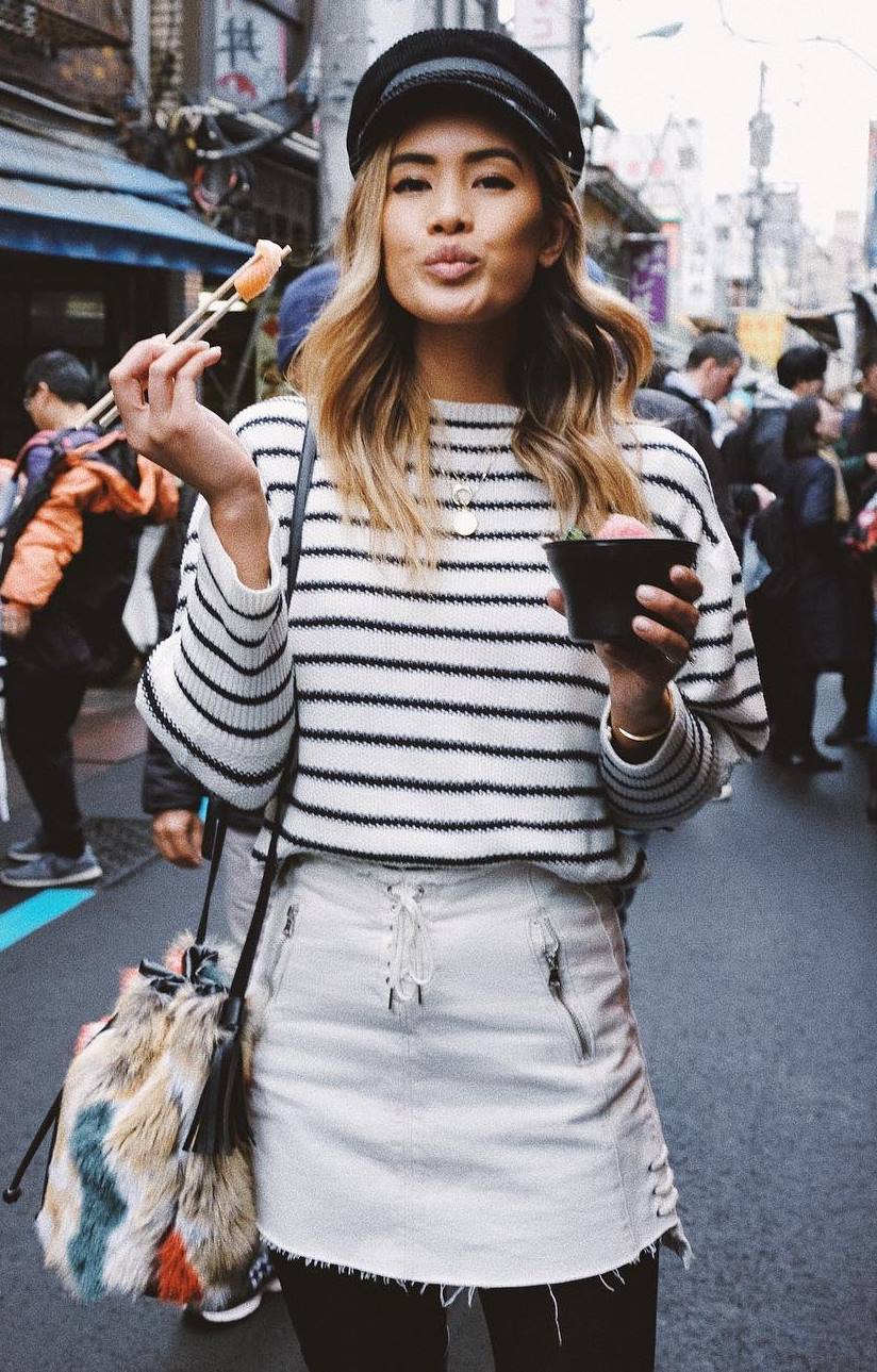 what to wear with a hat : striped sweater and white skirt