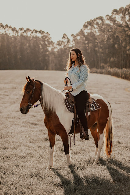 Woman riding horse: Photo by Paula Palmieri on Unsplash