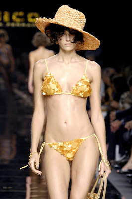 Valentina Zeliaeva on the runway in a bikini