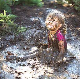 How does playing in mud improve children's immune system?