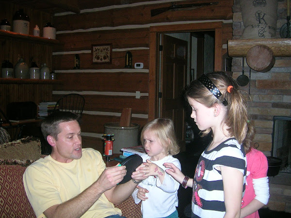 Jon playing Catch Phrase with the girls